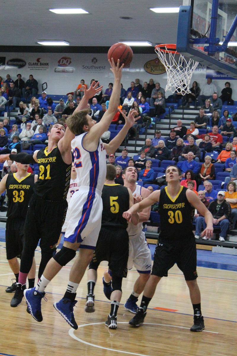 Junior Jim Stocki lays the ball up for 2 of his 17 points in WIAC home game against UW-Superior Jan. 25.
