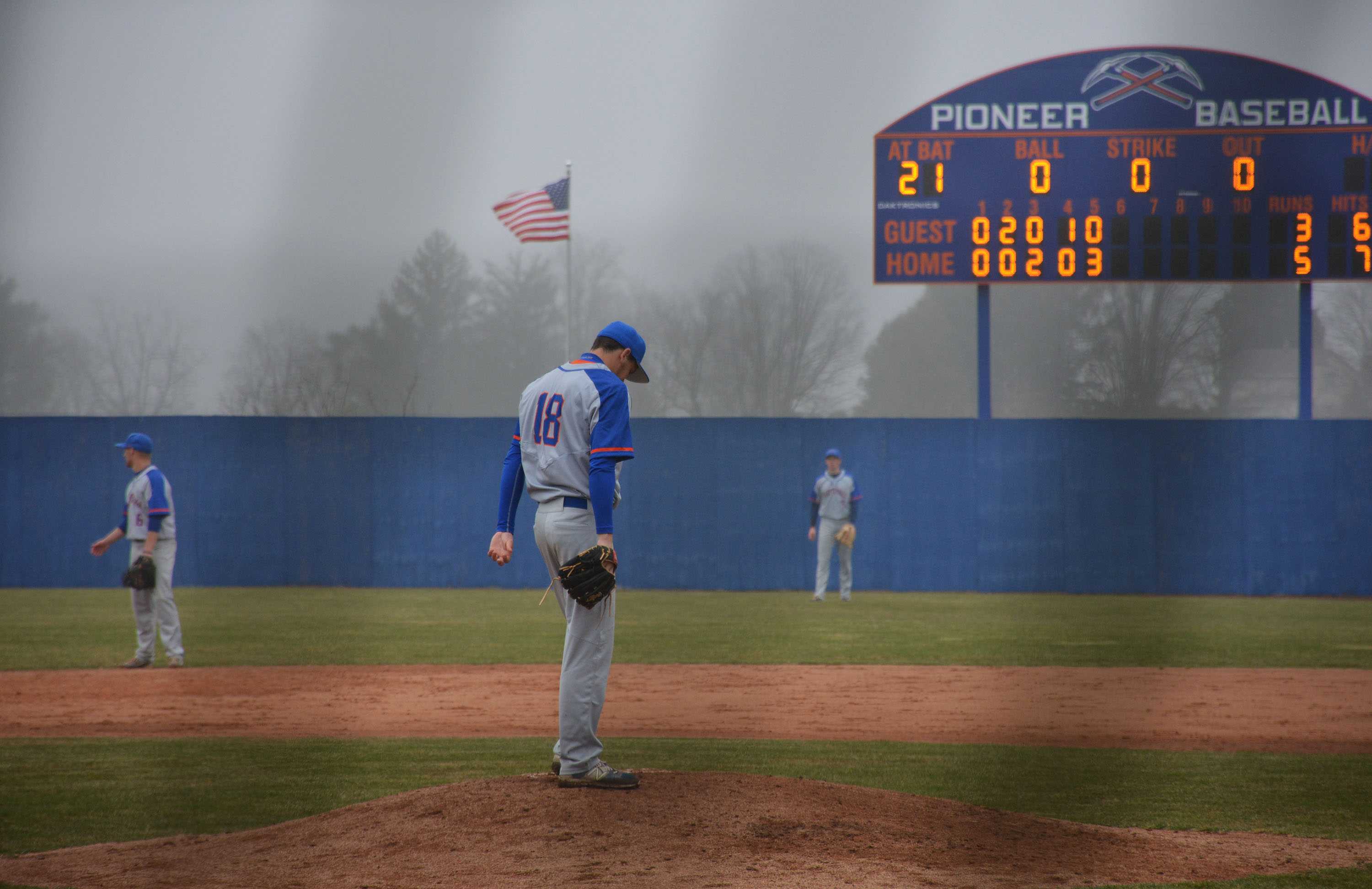 Sophomore business administration major Scottie Gordon prepares to pitch from the mound in the top of the sixth inning with Pioneer’s leading 5-3.