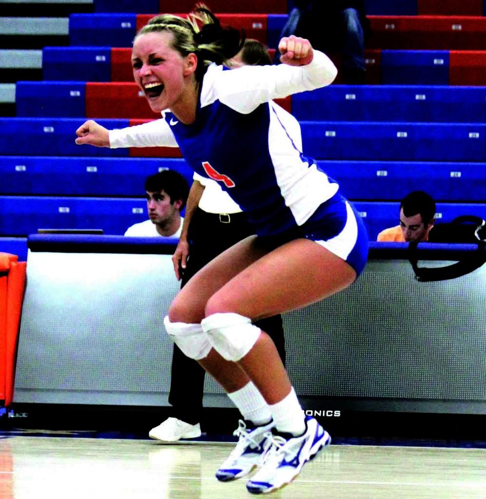 Senior Brooke Nichols celebrates a point in the Pioneers Dig for the Cure match against UW-Whitewater. 