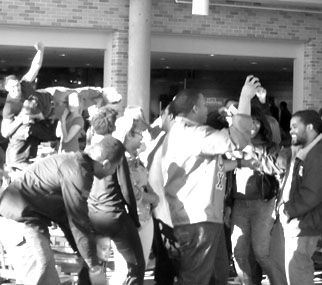 Students dance to the “Harlem Shake”, a song and dance that is viral on YouTube. They performed in the Pioneer Crossing in the Markee Pioneer Student Center.