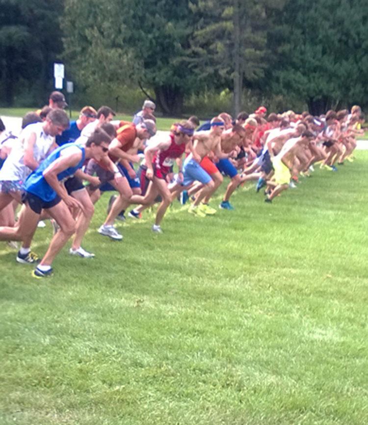 Men’s runners take their positions at the starting line of the UW-Platteville Alumni Meet Sept. 7.