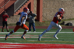 Sr. Db Kevin Ybarra (4) cannot catch NCC's Chad O'Kane (23) on a TD.