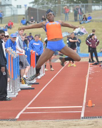 Amber Williams leaps in the long jump at the UW-Platteville Invitational