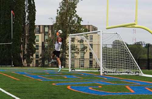 Scott Sibik blocking a goal during soccer practice.