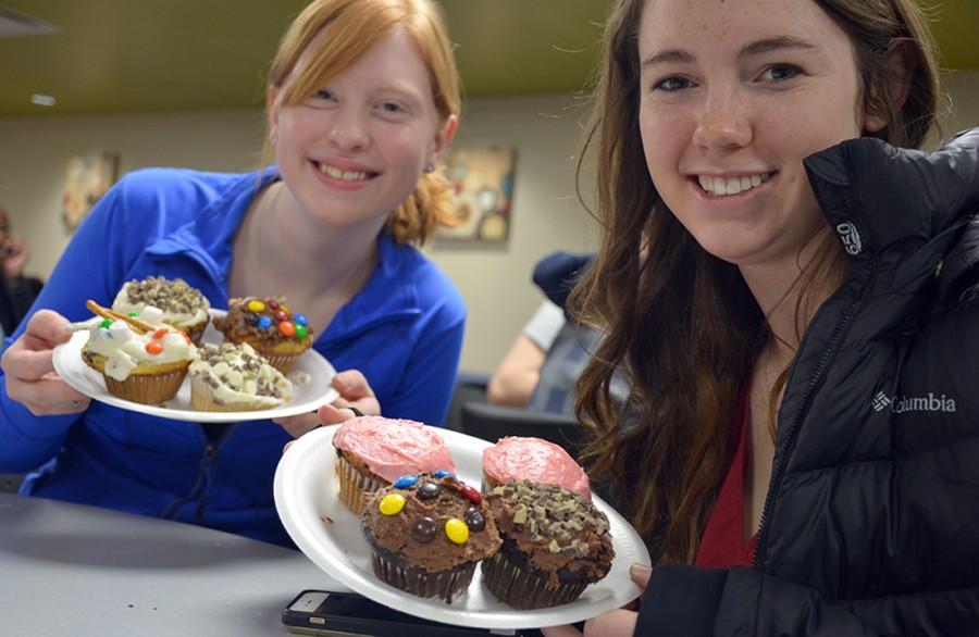 Mackenzie Arnold freshman environmental engineering major and Hannah Badbury senior business administration major participated in Cupcake Wars in Dobson Hall.