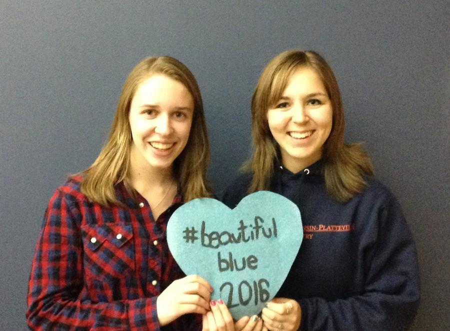 Camille Guenther and Rachel Eckmann display the hashtag
#beautifulblue2016, where pictures can be sent to show support for the project.