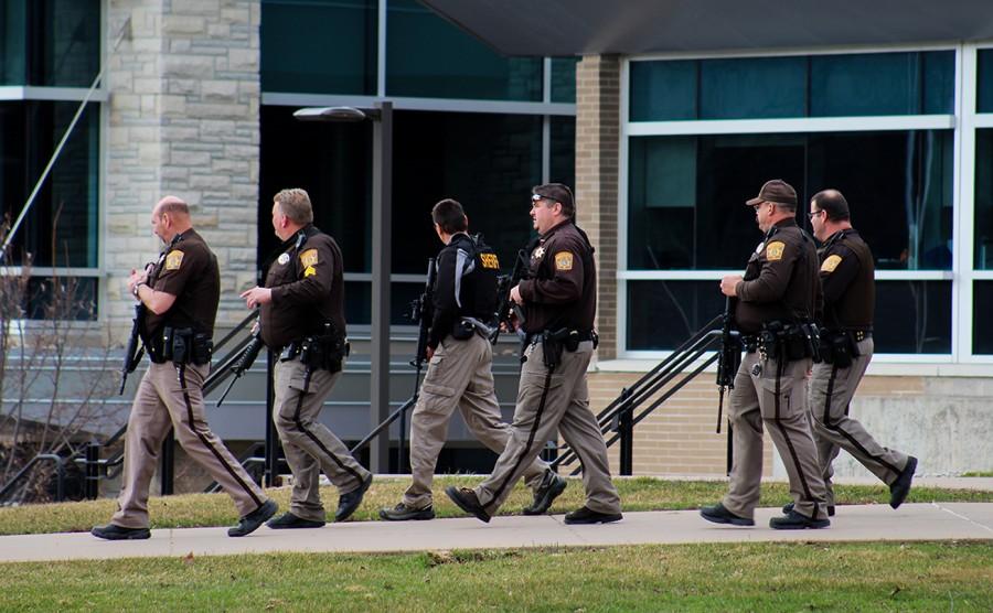 Grant County Sheriff’s Department patrol the University of Wisconsin-Platteville campus after reports of a firmarm in Ullsvik Hall. All buildings were evacuated after the 1:30 p.m. announcement.
