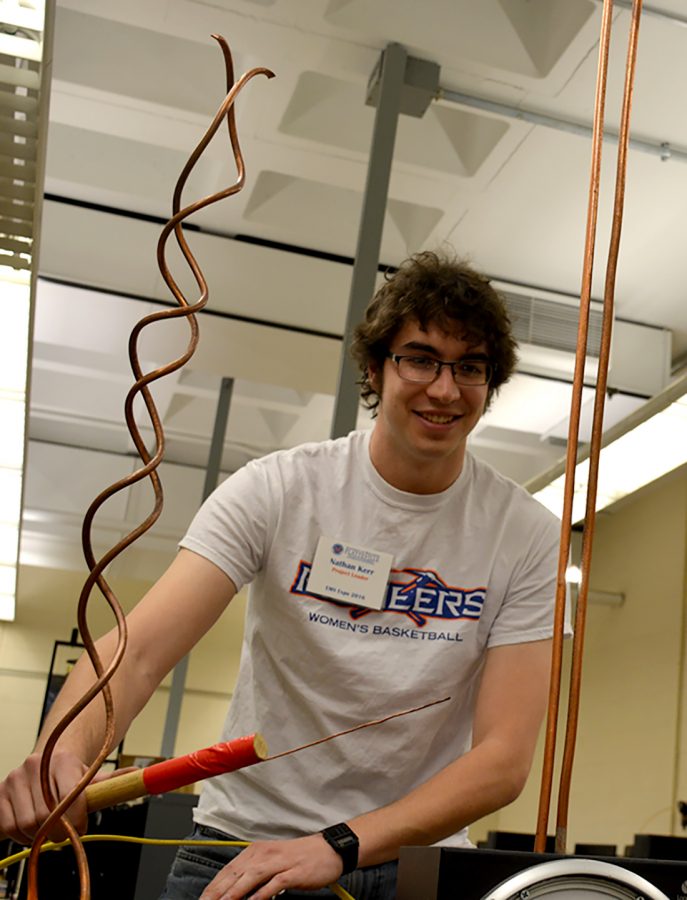 Nathan Kerr helps out at the Engineering Expo, which showed local students all about the STEM field.