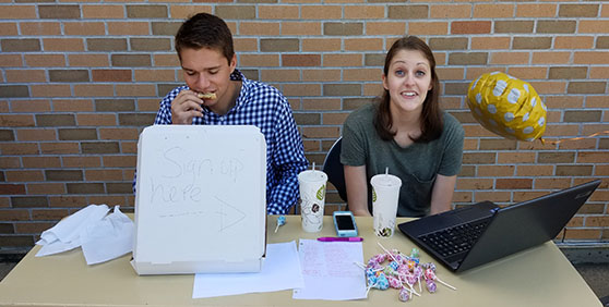 Sophomore mechanical engineer major, Brent Strand and sophomore industrial engineer major, Rebecca Koble work their booth at the Fall 2016 service fair. Strand and Koble were there representing the Pioneer Food Pantry organization. The Pioneer Food Pantry organization was established last year, and the organization is currently looking for a faculty adviser. 