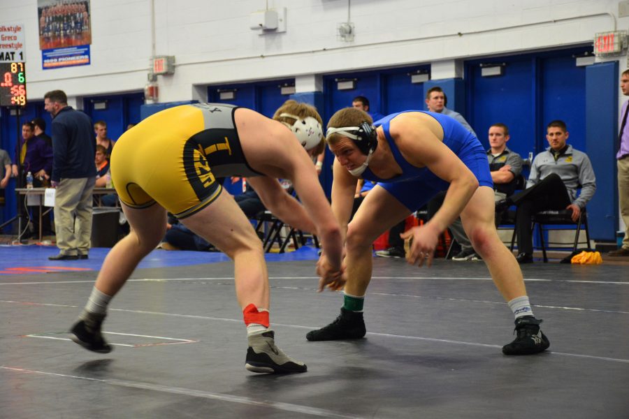 Junior mechanical engineering student Cody Meyer wrestled in the 197-pound weight class during the WIAC Conference Championships.  Meyer started the day with a second round loss before winning four straight matches to place third in the conference at 197 pounds.