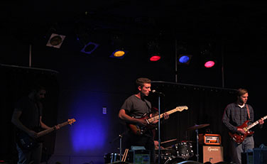 Lead singer Austin Wiese and bassist Ben Hansen rock out during their second Haus of Music set.  The band plans to continue playing their set throughout Wisconsin over the summer.