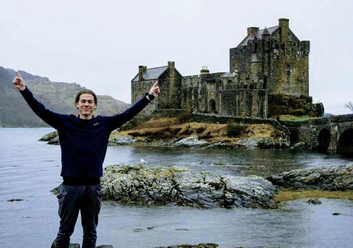 Senior mechanical engineering major Sylas Swank poses in front of an old castle during his time in Dublin, Ireland. 