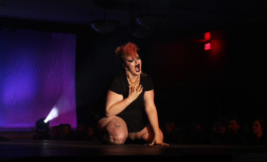 One of the performers falls to her knees as she lip syncs Gabbie Hanna’s “Out Loud” during the Rainbow Rave. 