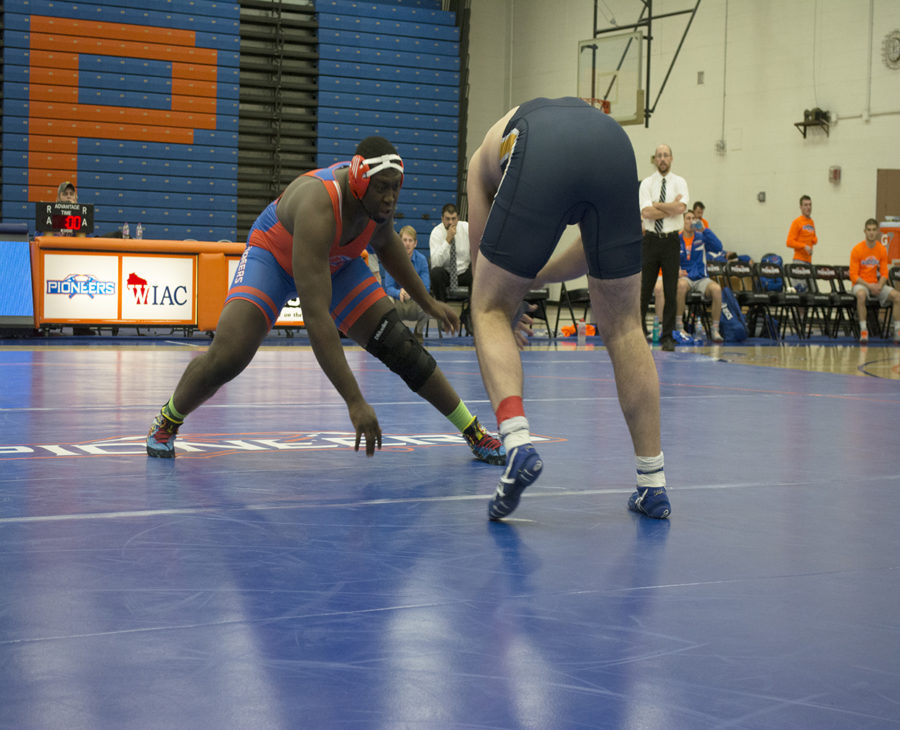 Heavyweight junior D’Andre Johnson won by pinfall to help the Pioneers take control during their dual meet against UW-Eau Claire.