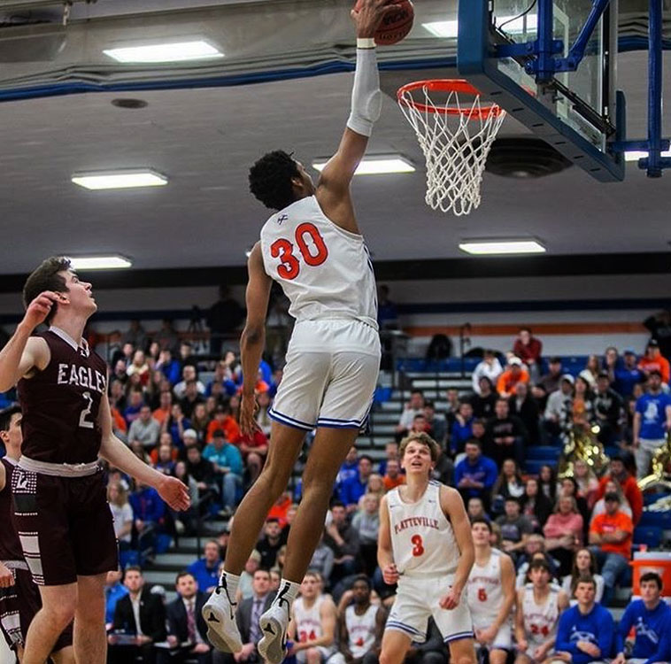 Junior business major Justin Stovall dunks.  