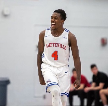 Junior point guard Q Shields #4 celebrates on the court as victory approaches. The sixth-ranked Pioneers are back in action in the WIAC tournament on Thursday.